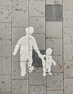 2 person walking on gray concrete pavement