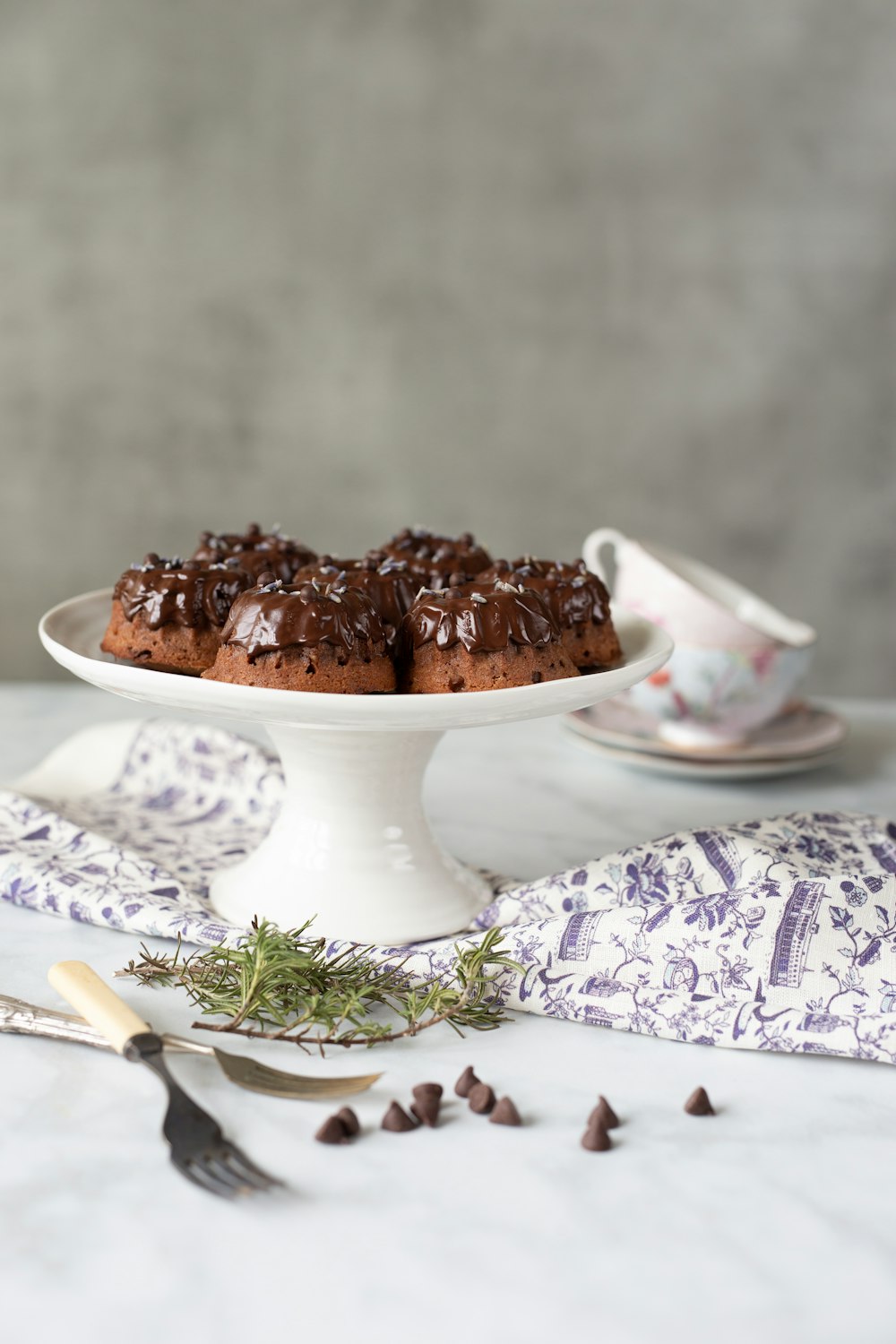 chocolate cake on white ceramic footed bowl
