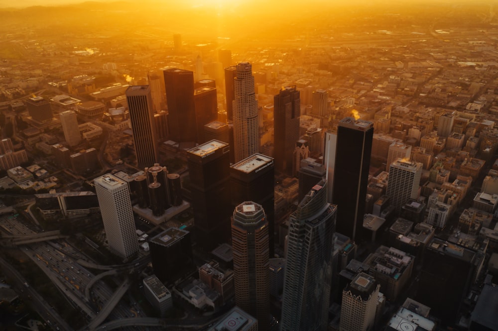 aerial view of city buildings during sunset