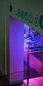 A sleek, modern workspace with purple and blue gradient lighting reflecting the innovative spirit of Xuntix.