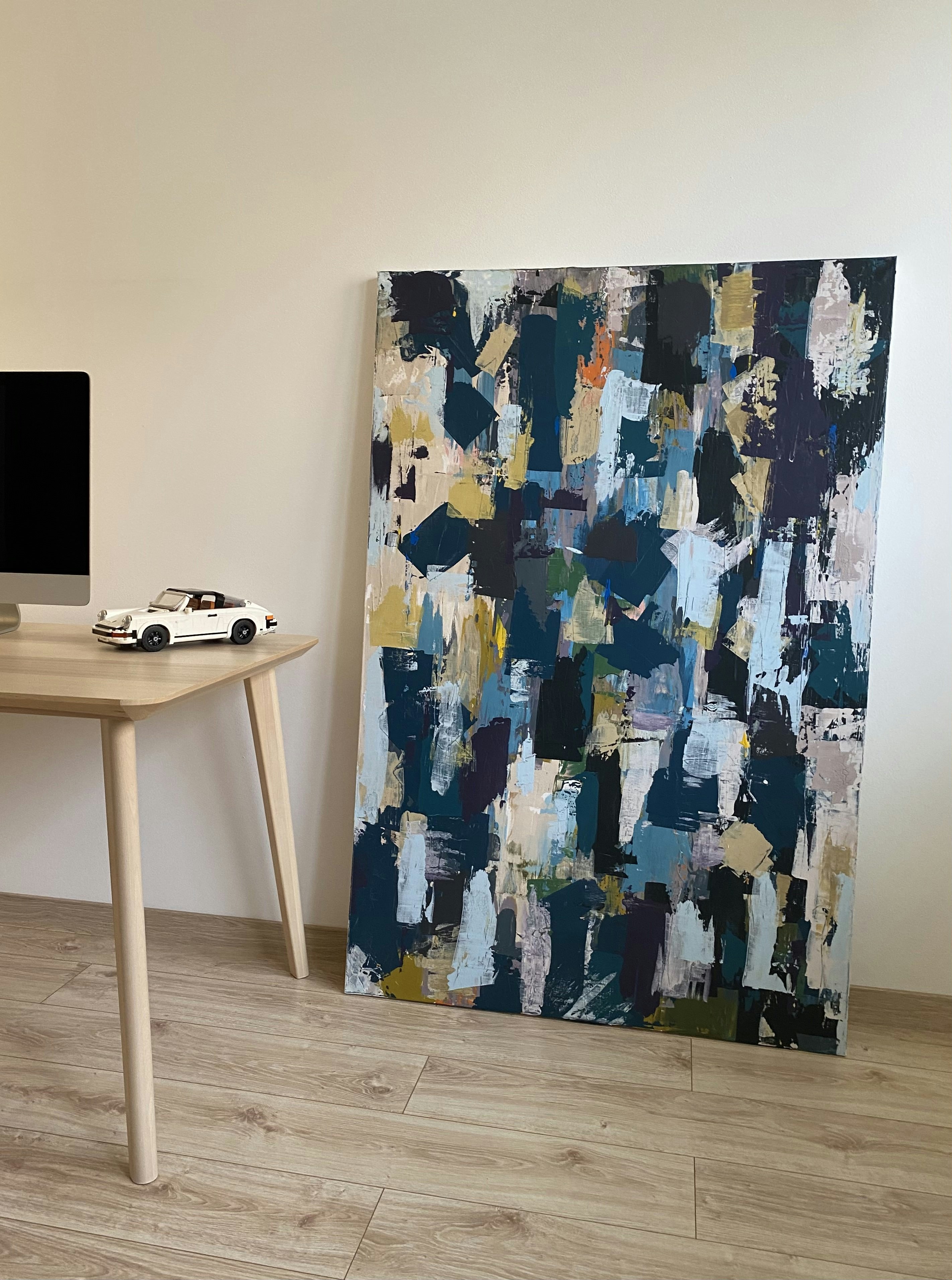 white and black electronic device on brown wooden table