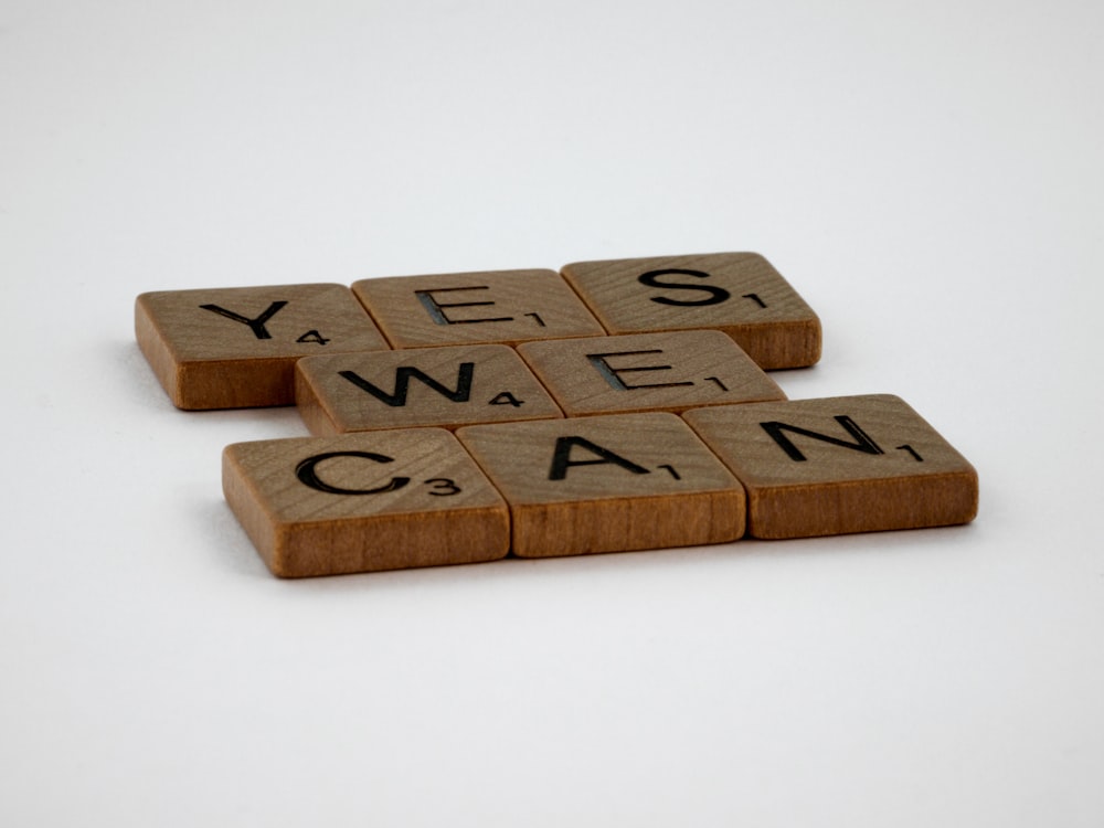 brown wooden letter i letter