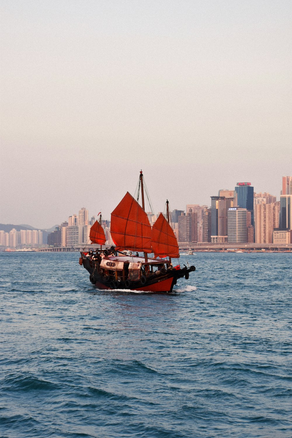 brown boat on sea during daytime