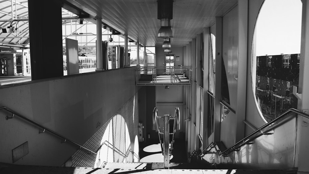 grayscale photo of empty restaurant