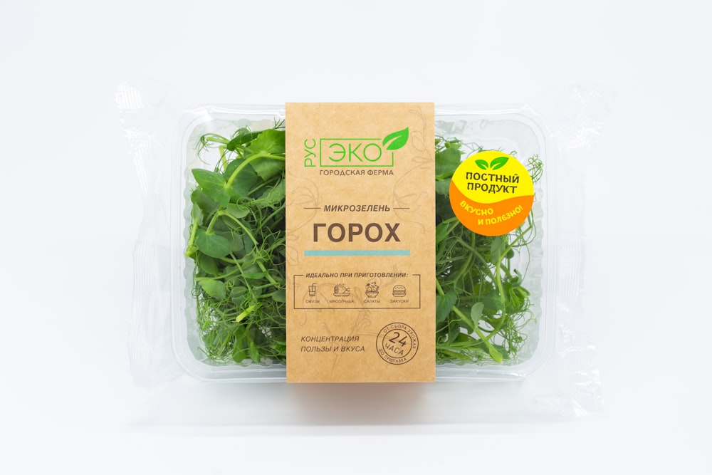 green leaves in clear plastic pack
