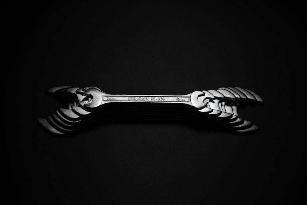 stainless steel fork with black background