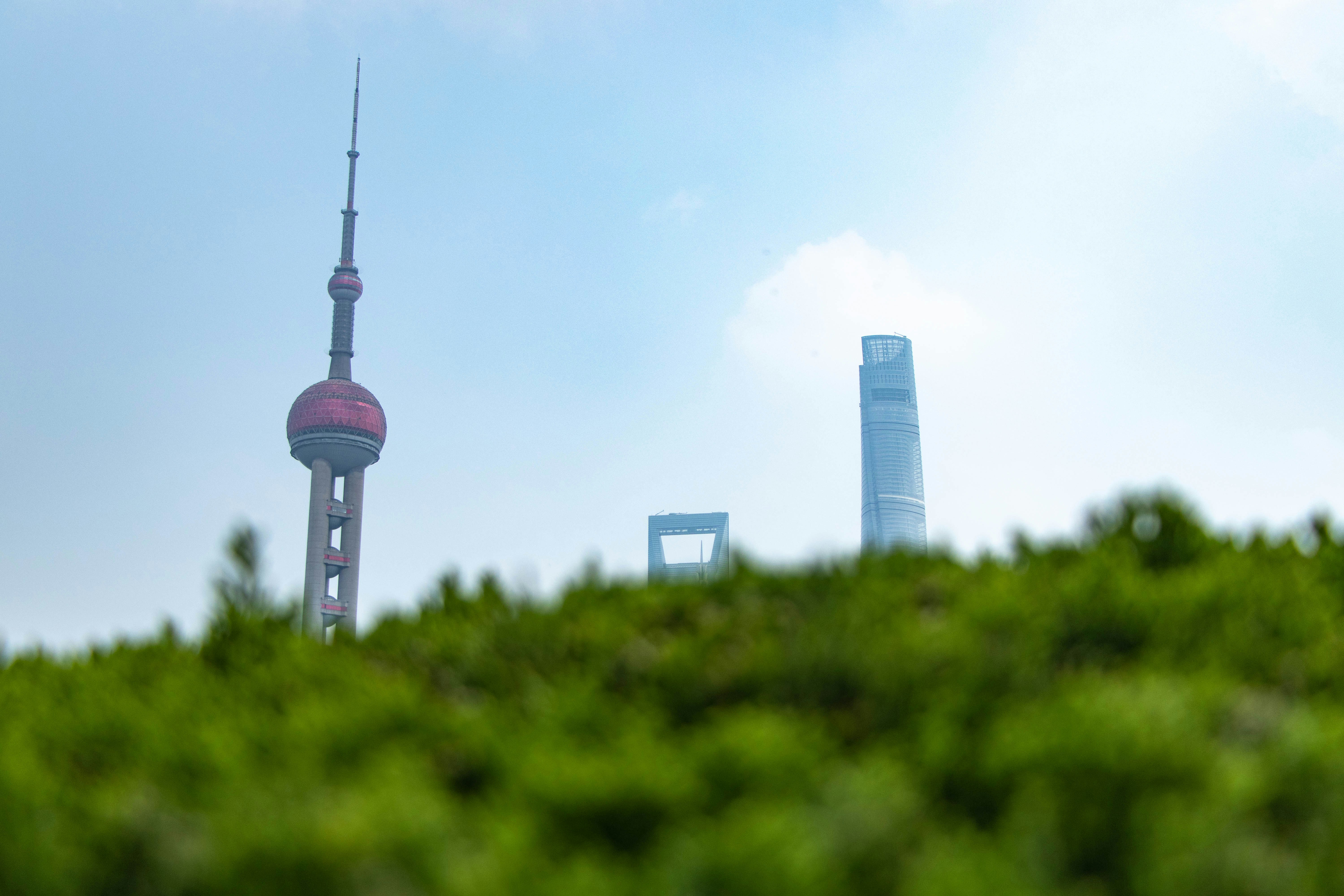 White and gray tower under white sky during daytime