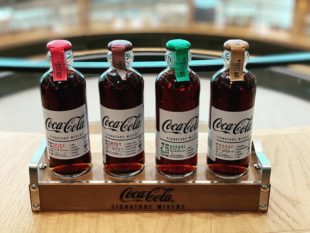 6 bottles on brown wooden crate