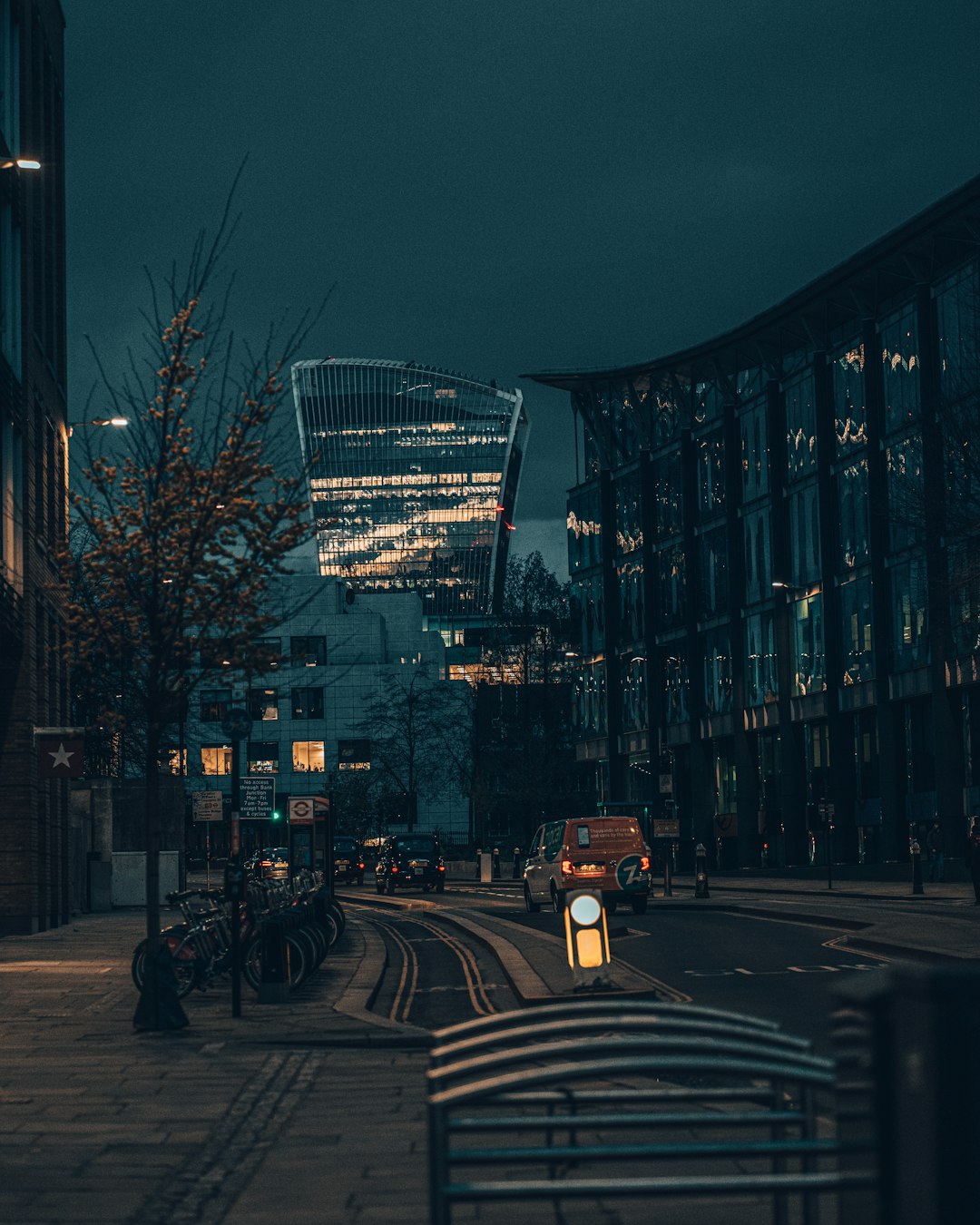 black and white city buildings during night time