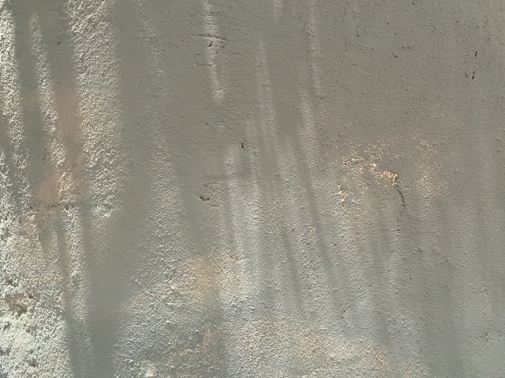 water droplets on gray concrete wall