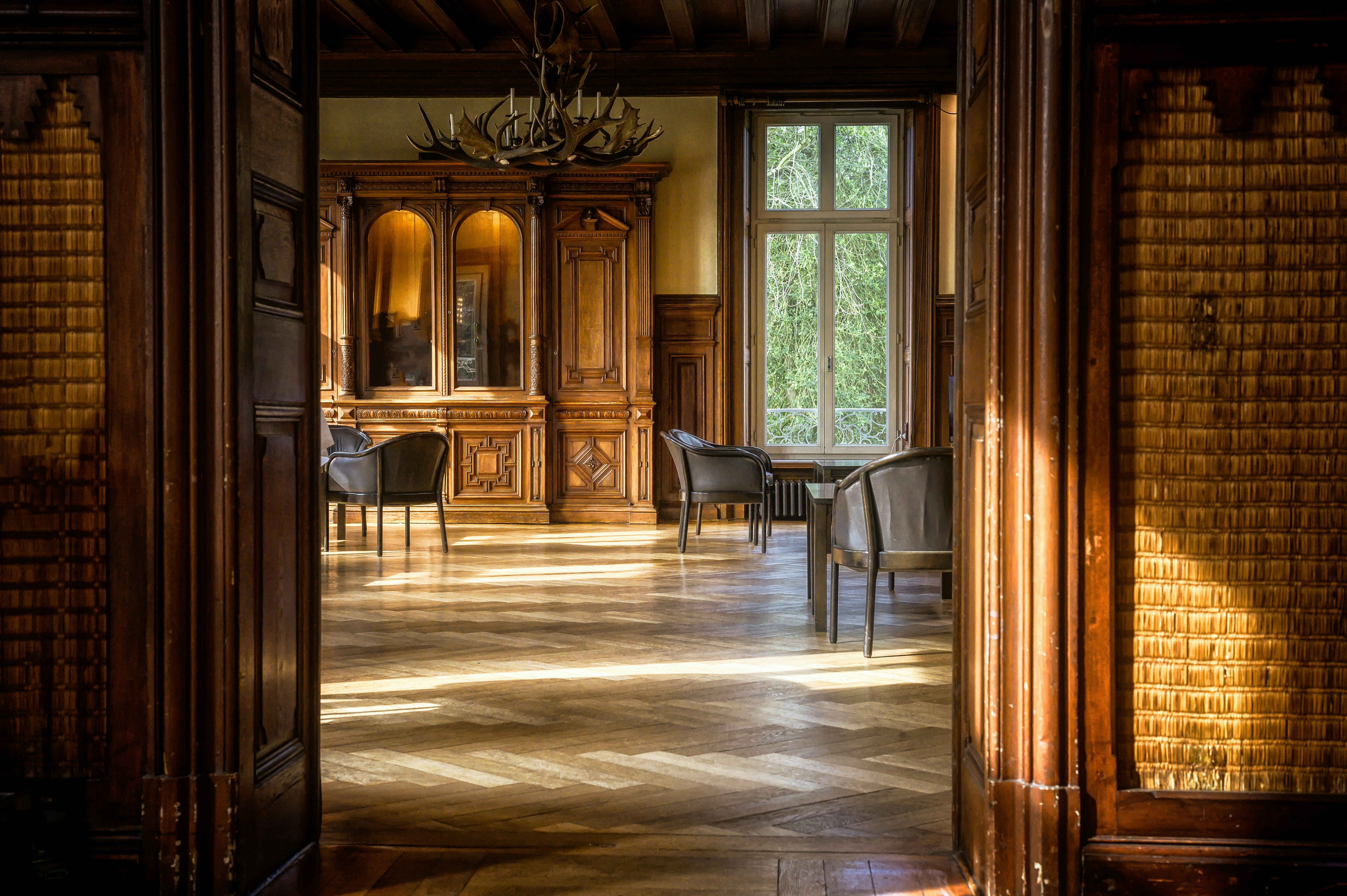 brown wooden door near brown wooden table