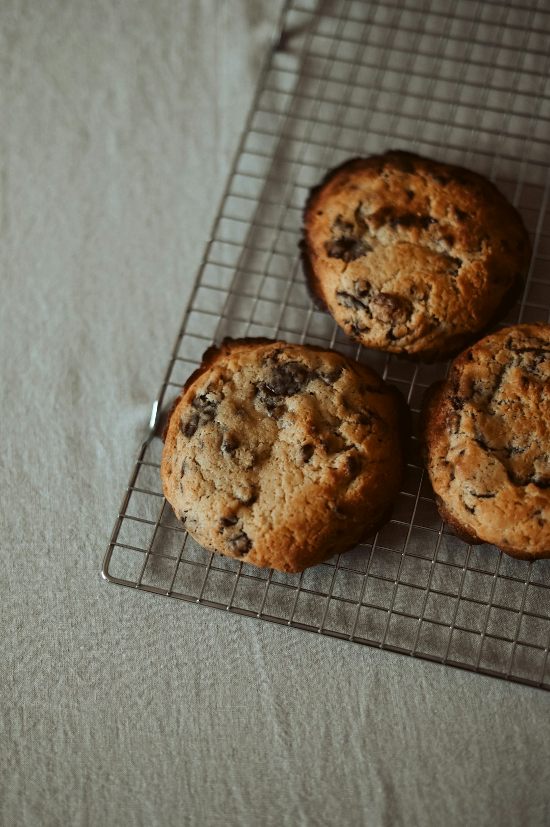 brown cookies on gray metal tray