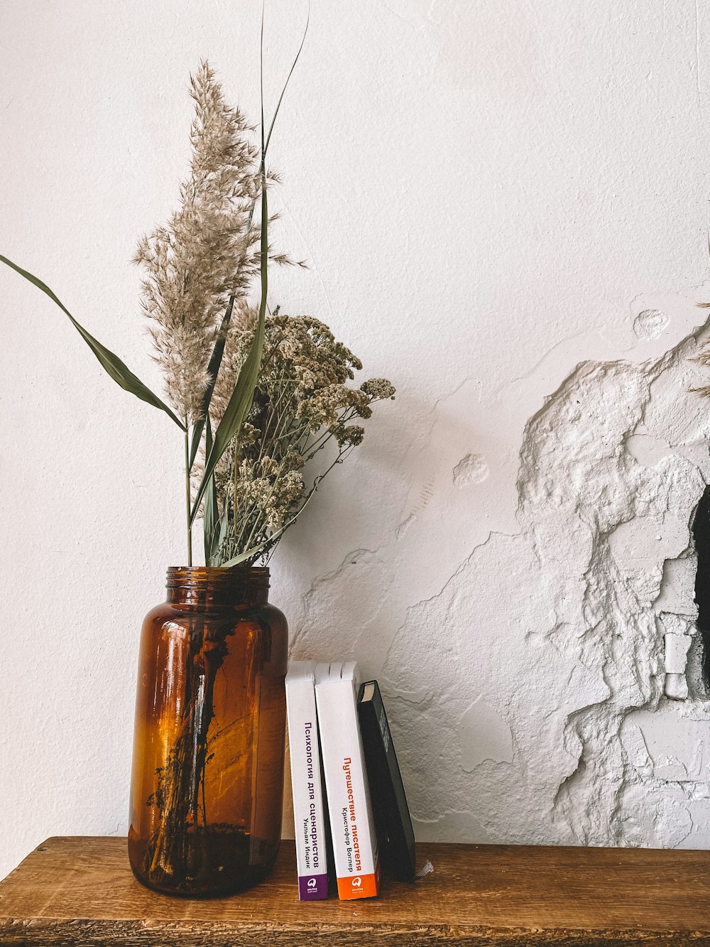 green plant on brown glass bottle