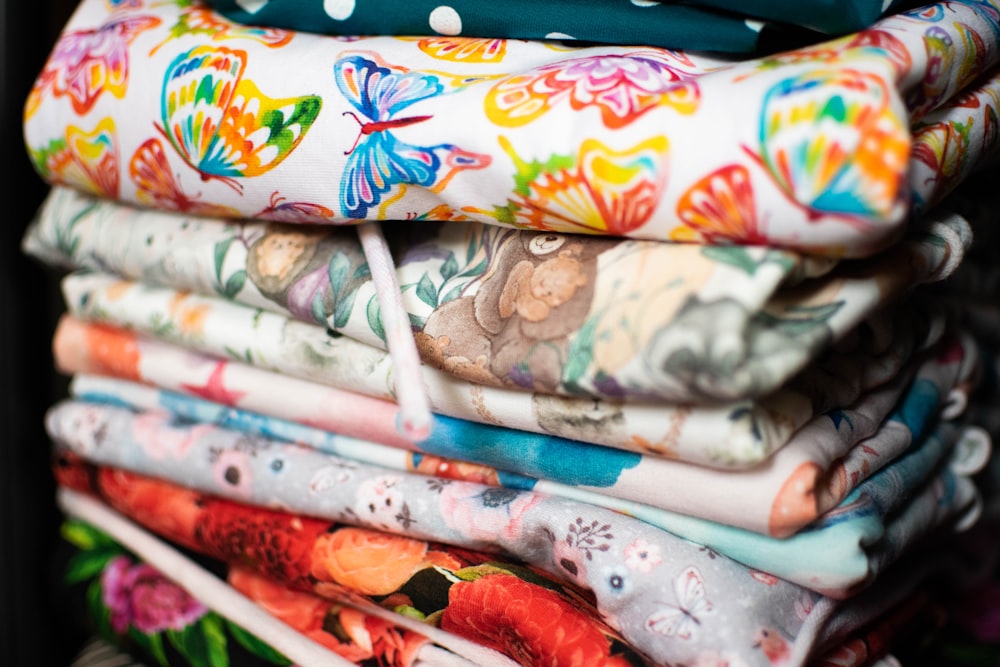 white blue and red floral textile