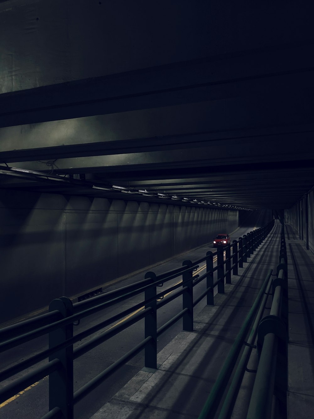 white and black train in tunnel