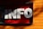 Large three-dimensional white letters spelling 'INFO' are mounted on a contrasting bright red background. The structure is attached to a wall with wooden planks painted in a vivid orange color, and gentle shadows are cast across the surface.