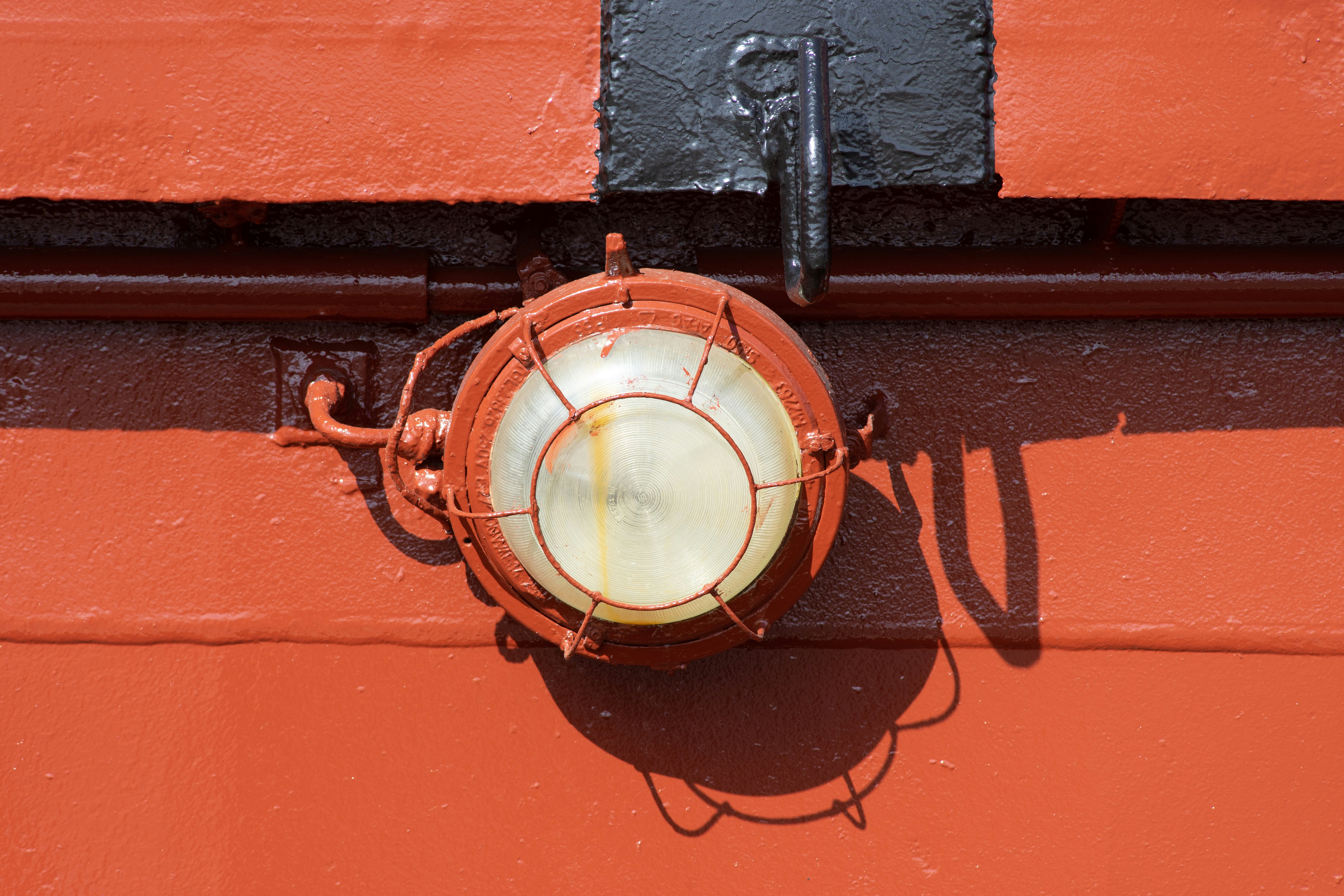 brown and white round wall mounted device