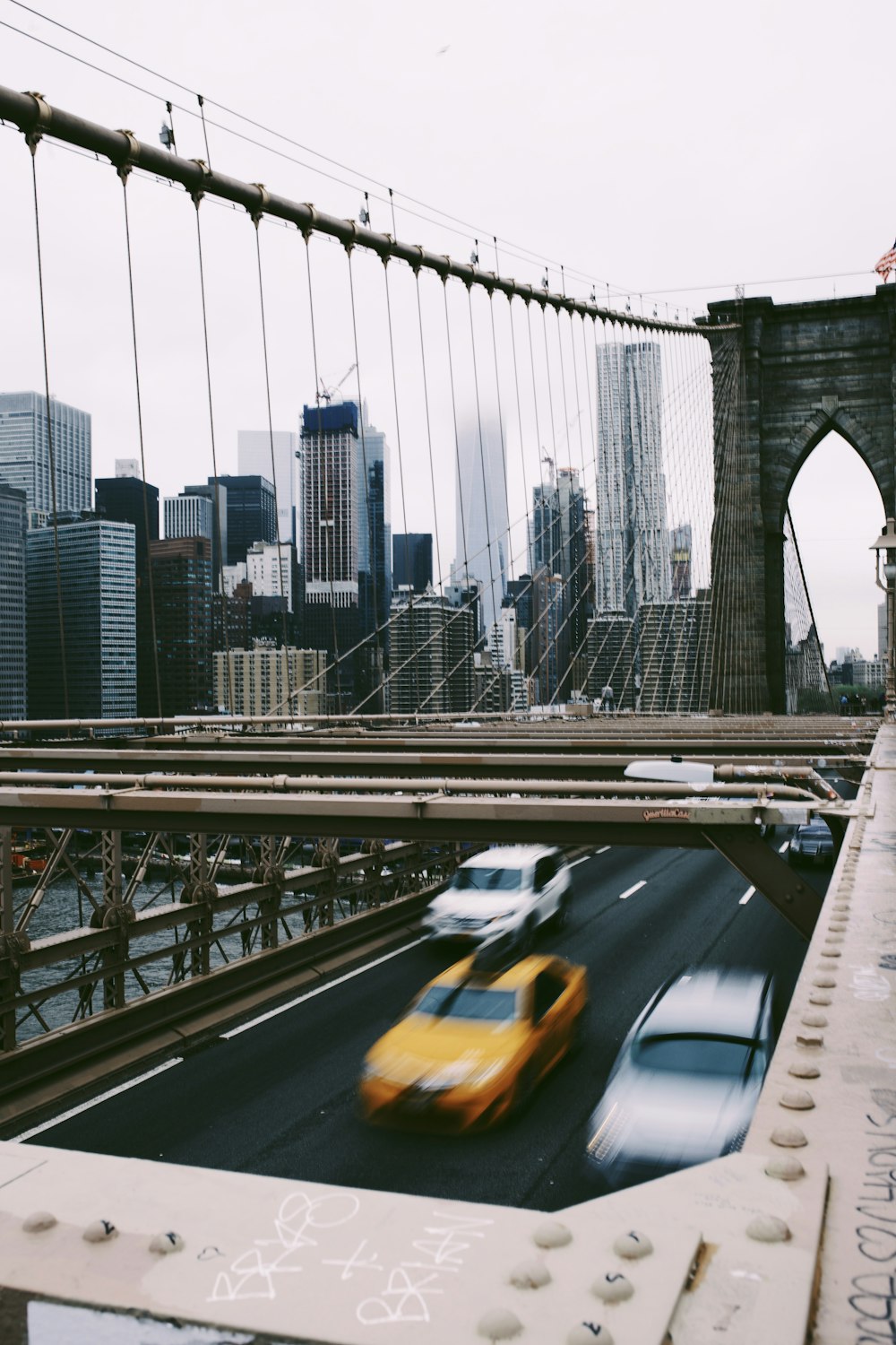 cars on bridge during daytime