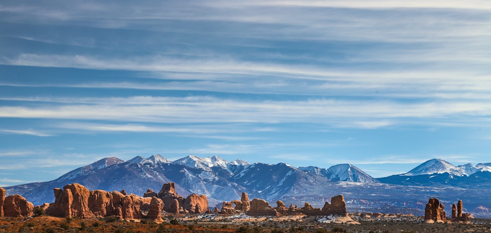 brown rocky mountain under blue sky during daytime