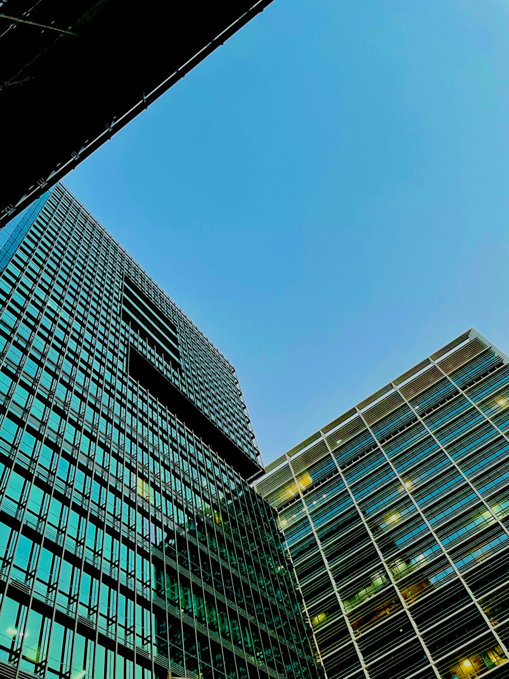 low angle photography of high rise building