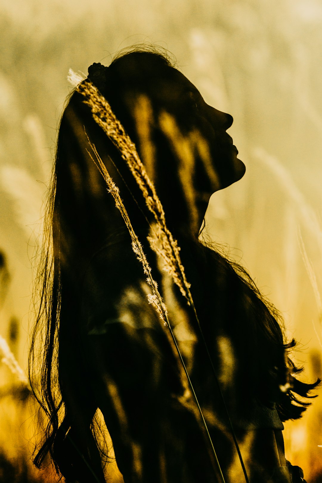 woman in black and brown floral scarf