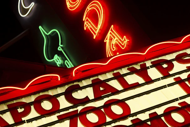 Outdoor signage featuring bold lettering and vibrant colors on a storefront