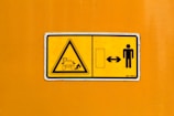 yellow and black no smoking sign