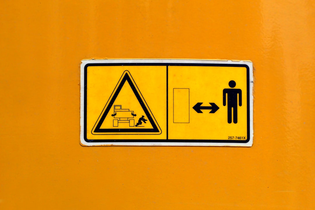 yellow and black no smoking sign