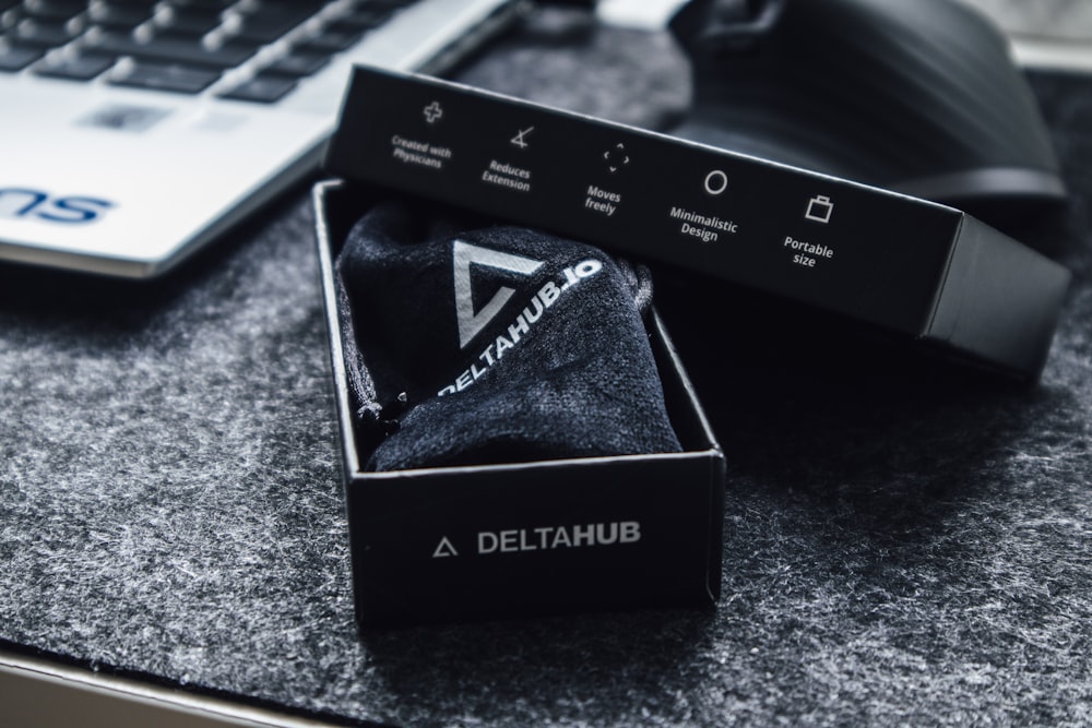 black and white box on black table