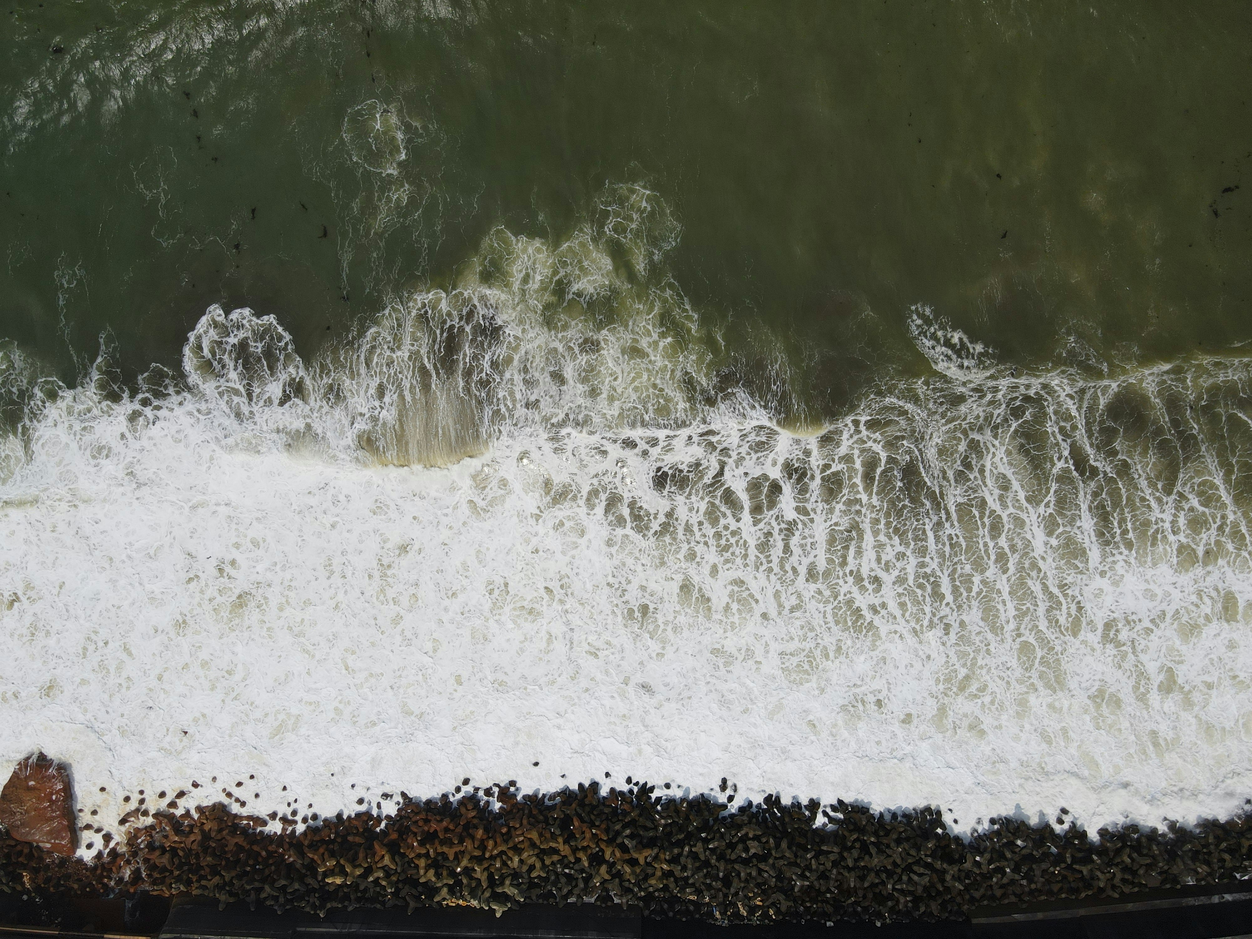 water waves on black sand