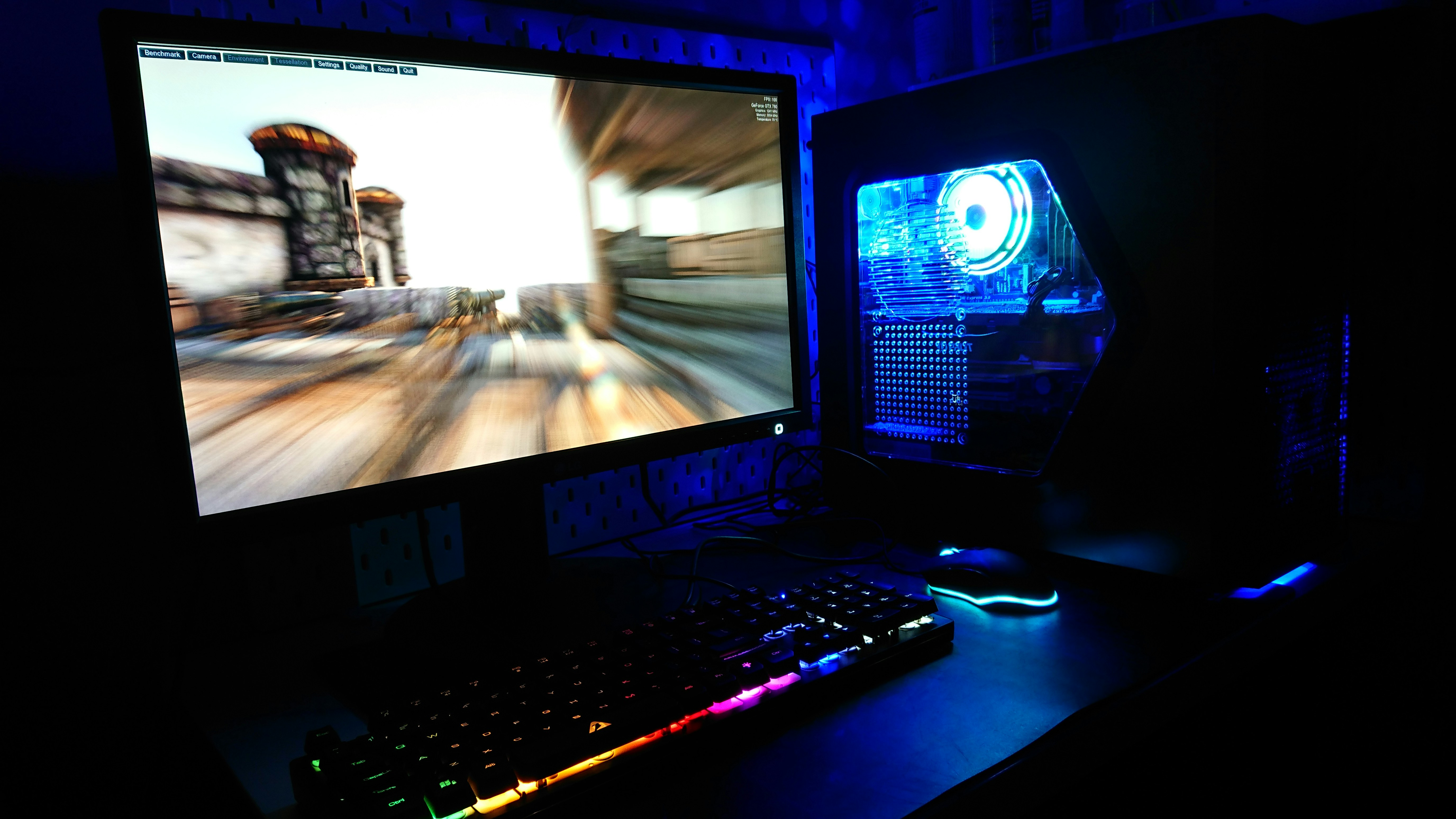 Gaming desktop tower with RGB lighting, bright clean background