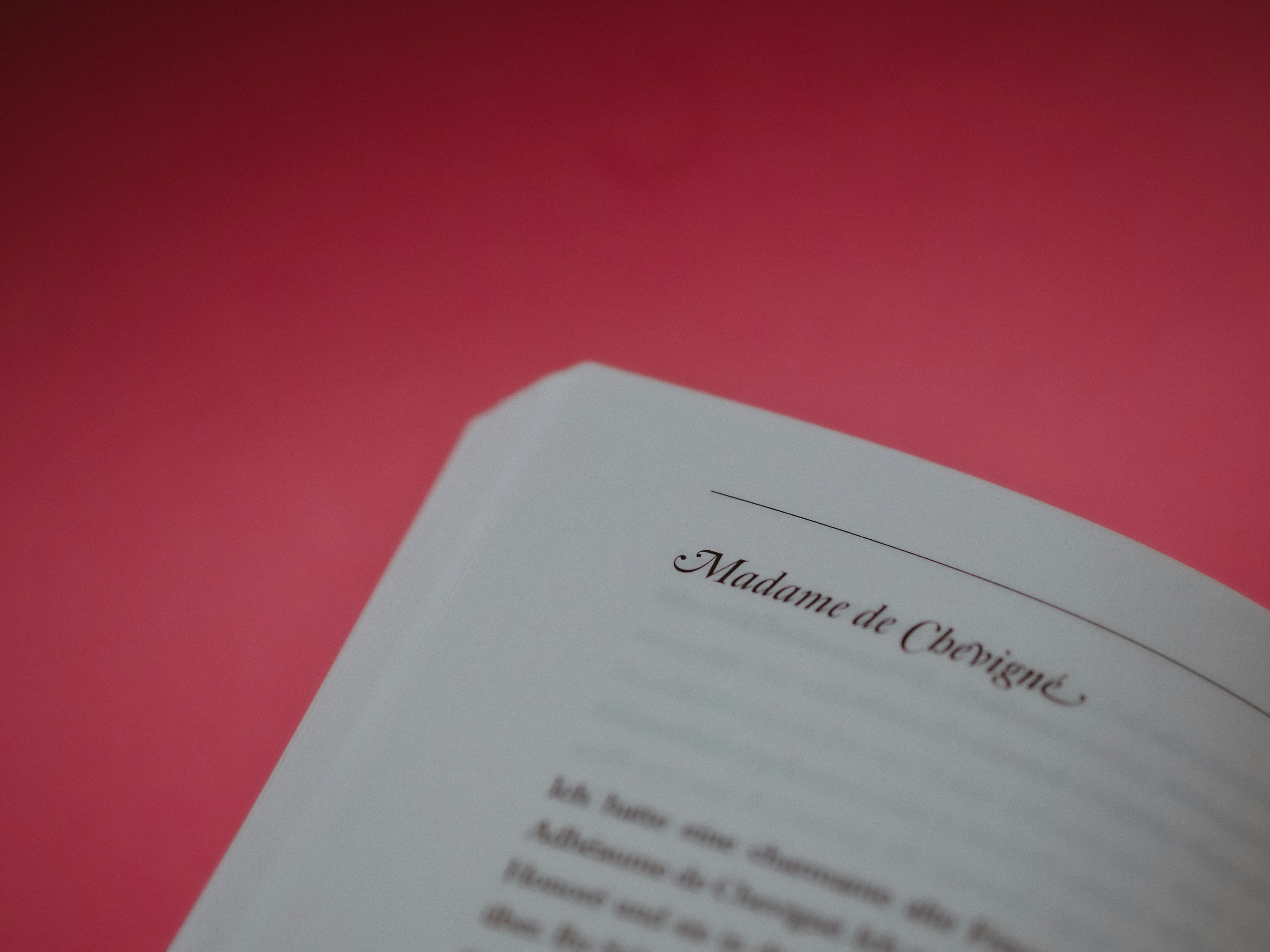 white printer paper on red surface