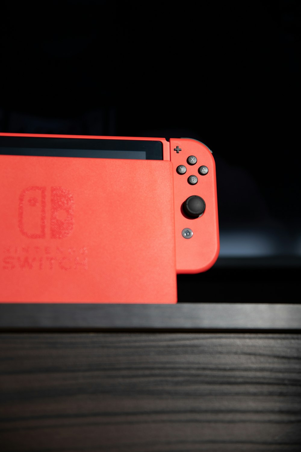 red nintendo switch game console