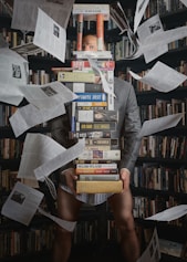 person holding white printer paper