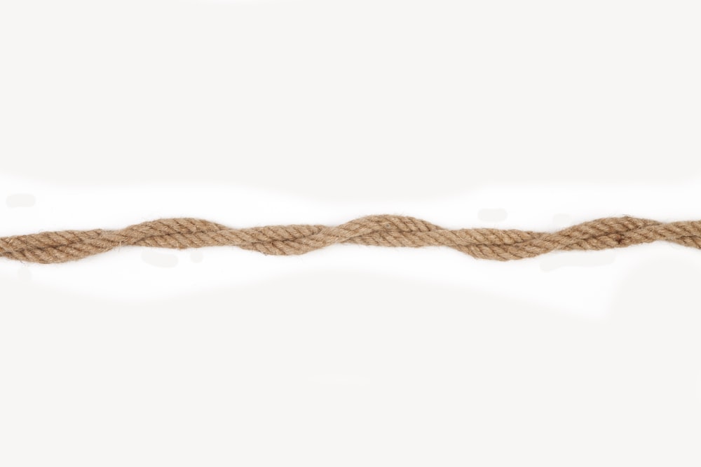 brown rope on white surface