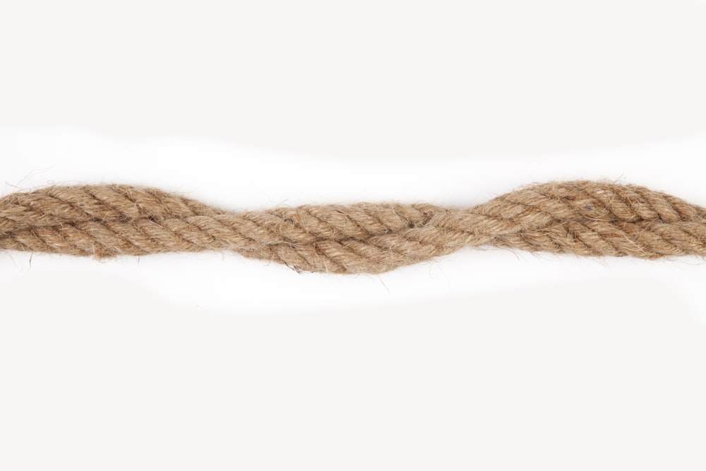 brown rope on white surface