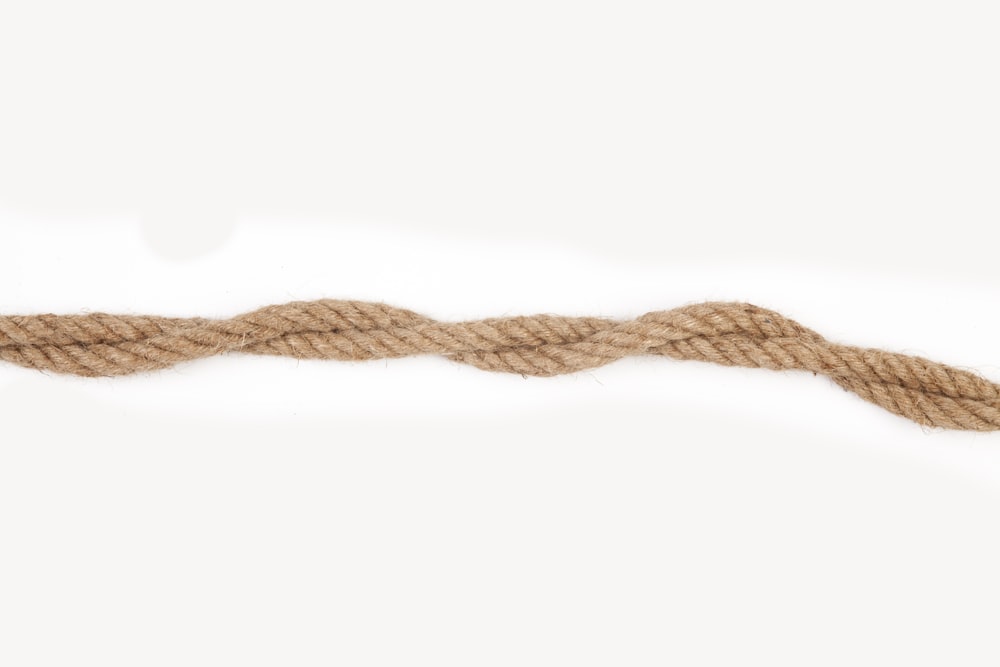 brown rope on white surface