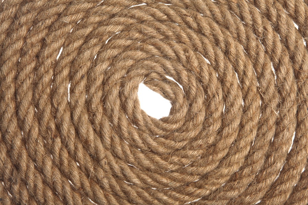 brown woven round basket in close up photography
