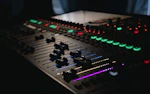 black and green audio mixer