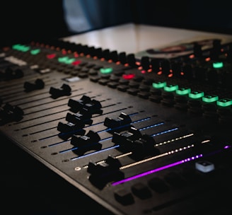 black and green audio mixer