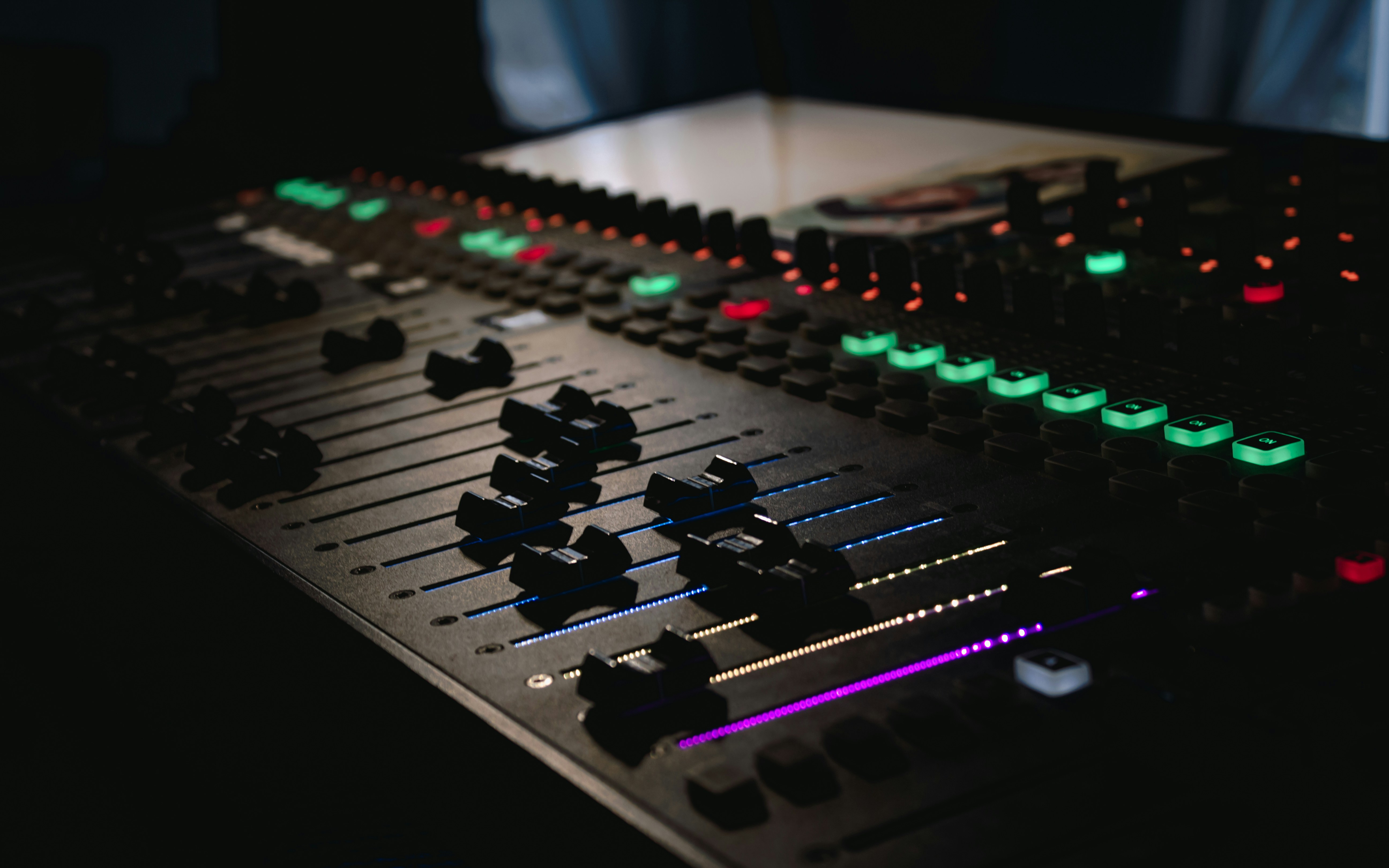 modern audio recording studio with high end broadcast microphone and digital mixing console