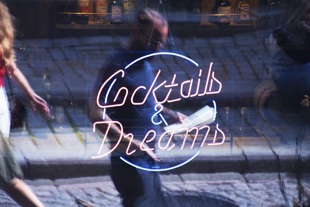 woman in black jacket standing in front of store