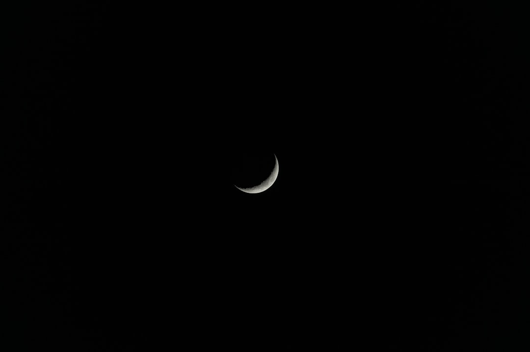 black and white crescent moon