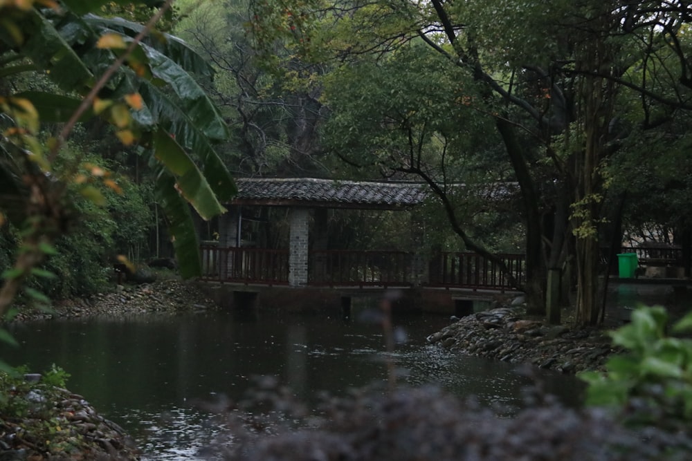 brown wooden bridge over river