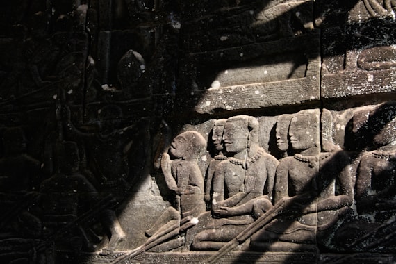 grayscale photo of man in suit jacket