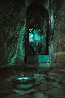 A serene blue and gray themed consultation room with mystical symbols softly glowing.