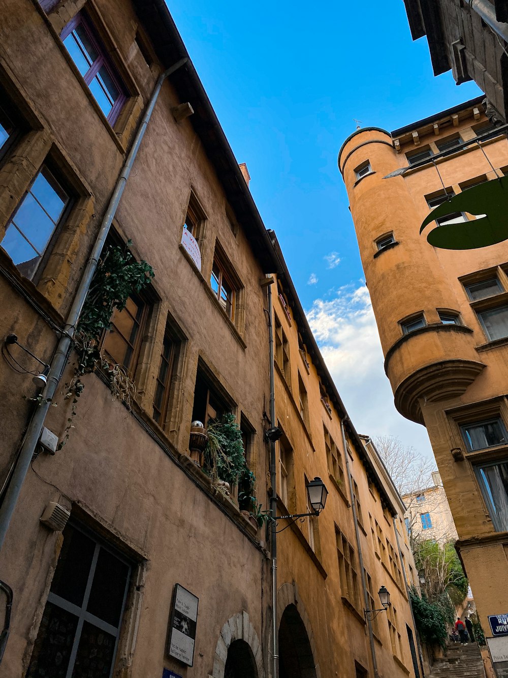 brown concrete building under blue sky during daytime