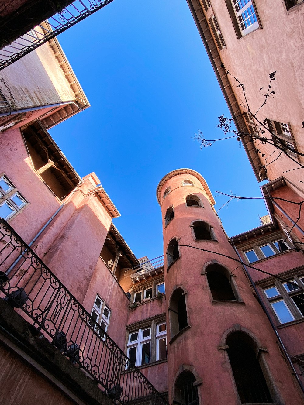 brown concrete building under blue sky during daytime