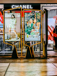woman in white long sleeve shirt and pants standing on train station