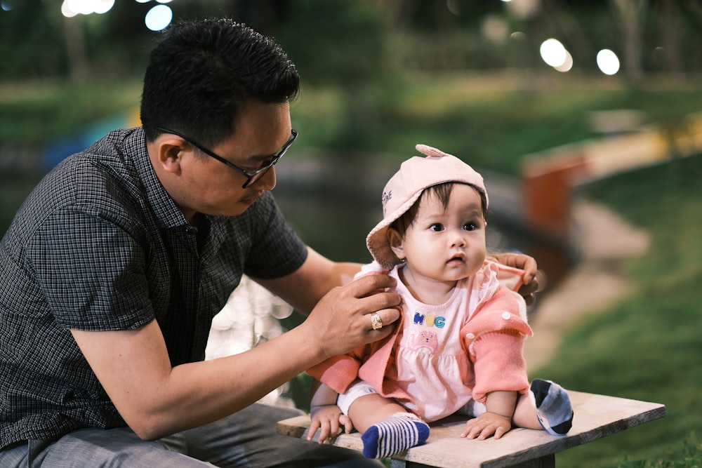 A baby with a person's head photo – Free Person Image on Unsplash